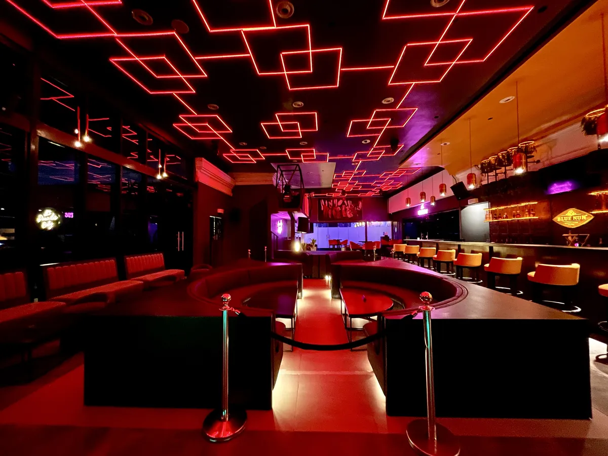 The event floor at Paradis Lagos, set beneath neon lighting